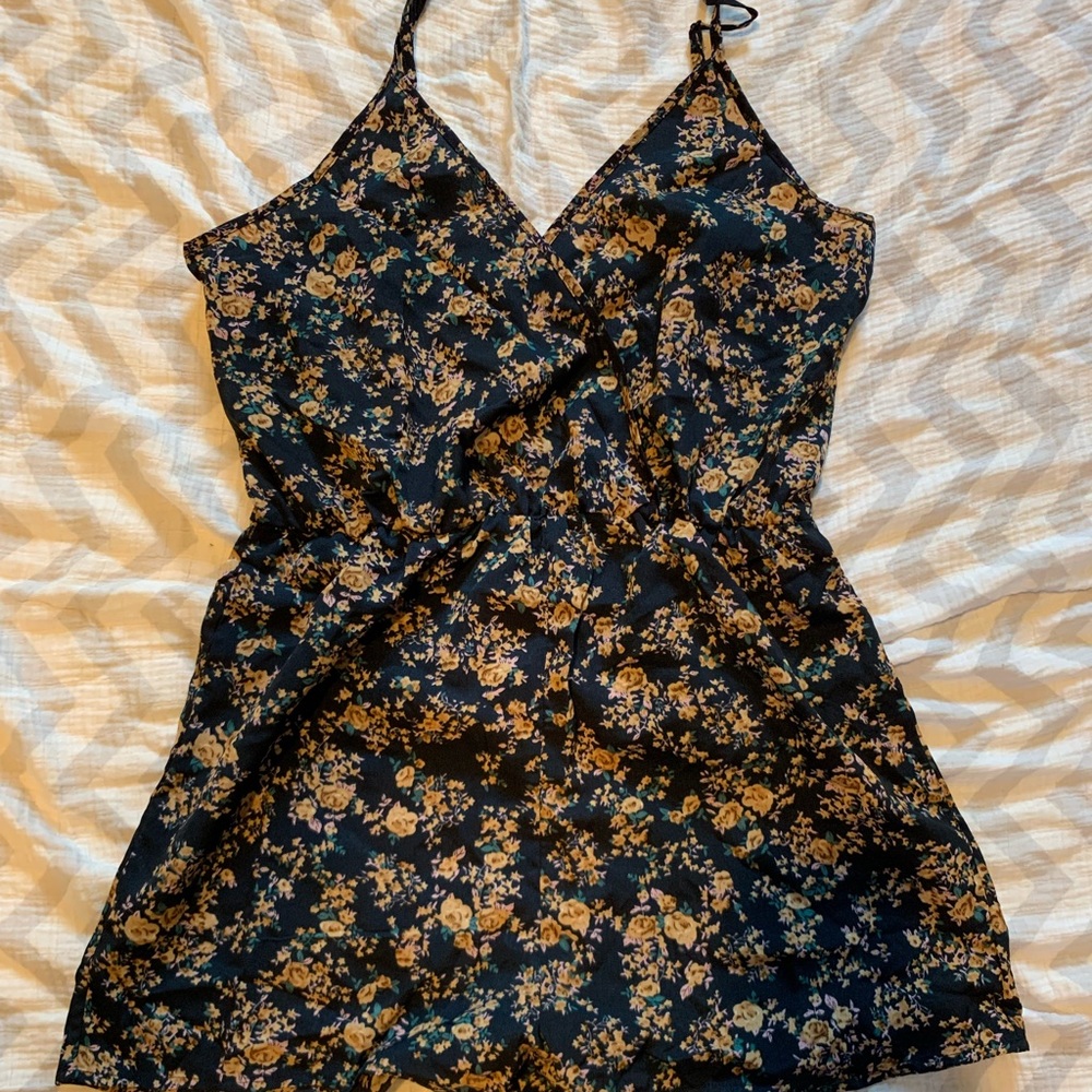 SHEIN navy romper with floral design